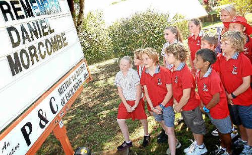 Students at Terranora Public School pause for a moment to honour Daniel Morcombe. 